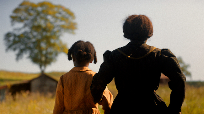 woman and child looking away